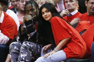 HOUSTON, TX - APRIL 25: Houston rapper Travis Scott and Kylie Jenner watch courtside during Game Five of the Western Conference Quarterfinals game of the 2017 NBA Playoffs at Toyota Center on April 25, 2017 in Houston, Texas. NOTE TO USER: User expressly acknowledges and agrees that, by downloading and/or using this photograph, user is consenting to the terms and conditions of the Getty Images License Agreement. (Photo by Bob Levey/Getty Images)