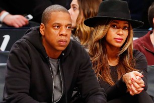 NEW YORK, NY - JANUARY 12: (NEW YORK DAILIES OUT) Musicians Jay-Z and Beyonce attend a game between the Brooklyn Nets and the Houston Rockets at Barclays Center on January 12, 2015 in the Brooklyn borough of New York City. The Rockets defeated the Nets 113-99. NOTE TO USER: User expressly acknowledges and agrees that, by downloading and/or using this Photograph, user is consenting to the terms and conditions of the Getty Images License Agreement. (Photo by Jim McIsaac/Getty Images)