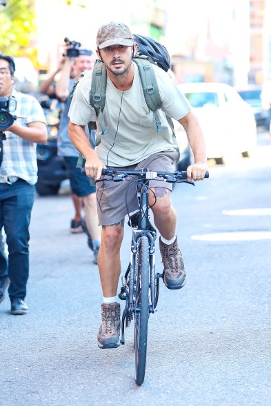 Shia LaBeouf goes for a bike ride while been chase by paparazzi in New York City