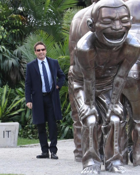David Duchovny is seen checking out the Laughing Statues while filming The X Files in Vancouver