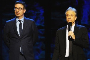 NEW YORK, NY - FEBRUARY 28: John Oliver (L) and Jon Stewart perform on stage at Comedy Central's 'Night of Too Many Stars: America Comes Together For Autism Programs' on February 28, 2015 in New York City. (Photo by Andrew Toth/FilmMagic)