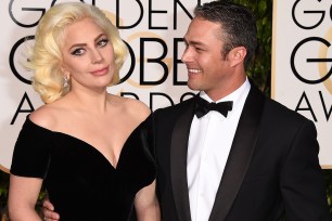 BEVERLY HILLS, CA - JANUARY 10: Singer/actress Lady Gaga and actor Taylor Kinney attend the 73rd Annual Golden Globe Awards held at the Beverly Hilton Hotel on January 10, 2016 in Beverly Hills, California. (Photo by Jason Merritt/Getty Images)