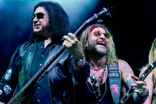 Gene Simmons, left, performs at The Children Matter: Houston Benefit Concert at CHS Field Wednesday, Sept. 20, 2017 in in St. Paul, Minn. Original Kiss members Gene Simmons and Ace Frehley reunited for their first public appearance since their group was inducted into the Rock and Roll Hall of Fame in 2014. (Carlos Gonzalez/Star Tribune via AP)