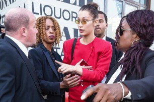 Bella Hadid scolds a security guard after he pushes photographers too strongly following the Michael Kors Show in New York City, USA. Pictured: Bella Hadid Ref: SPL1577730 130917 Picture by: Splash News Splash News and Pictures Los Angeles: 310-821-2666 New York: 212-619-2666 London: 870-934-2666 photodesk@splashnews.com