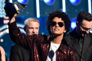 Bruno Mars accepts his award for Record of the Year at the 2018 Grammy Awards on Jan. 28, 2018