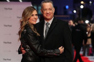 US actor Tom Hanks and his wife, US actress Rita Wilson (L) pose on the red carpet on arrival for the European Premiere of The Post in London on January 10, 2018. / AFP PHOTO / Daniel LEAL-OLIVAS (Photo credit should read DANIEL LEAL-OLIVAS/AFP/Getty Images)