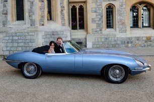 Meghan Markle and Prince Harry depart in their eco-friendly Jaguar