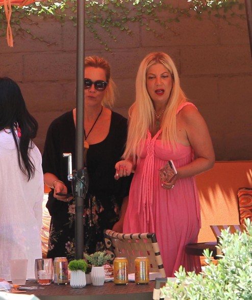 Tori Spelling celebrates her 45th birthday alongside Jennie Garth at the Garland Hotel in Los Angeles.