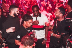 Drake parties with fellow A-listers at Story Nightclub in Miami.