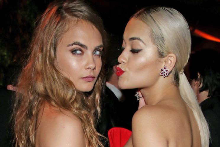 BEVERLY HILLS, CA - JANUARY 11: Model Cara Delevingne (L) and musician Rita Ora attend The Weinstein Company & Netflix's 2015 Golden Globes After Party presented by FIJI Water, Lexus, Laura Mercier and Marie Claire at The Beverly Hilton Hotel on January 11, 2015 in Beverly Hills, California. (Photo by Jonathan Leibson/Getty Images for TWC)