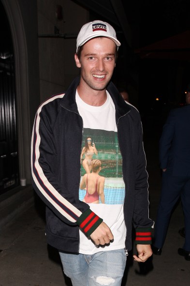 Patrick Schwarzenegger wears a t-shirt with Kim Kardashian on it as he leaves Craig's in West Hollywood.