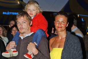 Norman Reedus, son Mingus and Helena Christensen in 2003