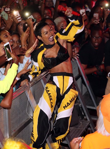 Teyana Taylor brings the energy in racing gear while performing in New York.