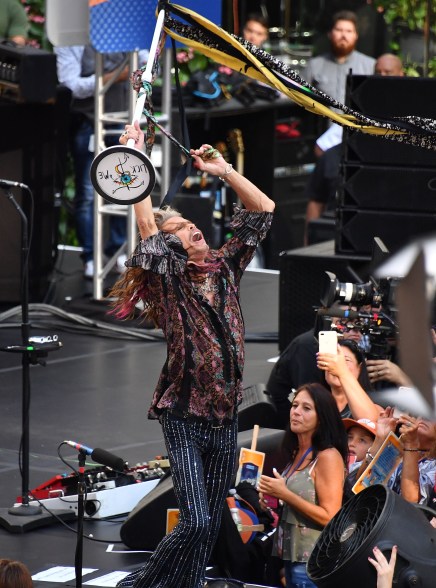 Steven Tyler swings his microphone stand around while performing with Aerosmith on "Today."