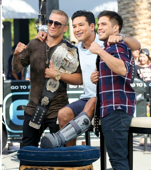 Mario Lopez gets support from UFC Champs T.J. Dillashaw and Henry Cejudo on "Extra."