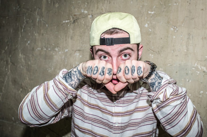 Mac Miller poses during photo session backstage at Casino de Paris on May 30, 2012 in Paris, France.