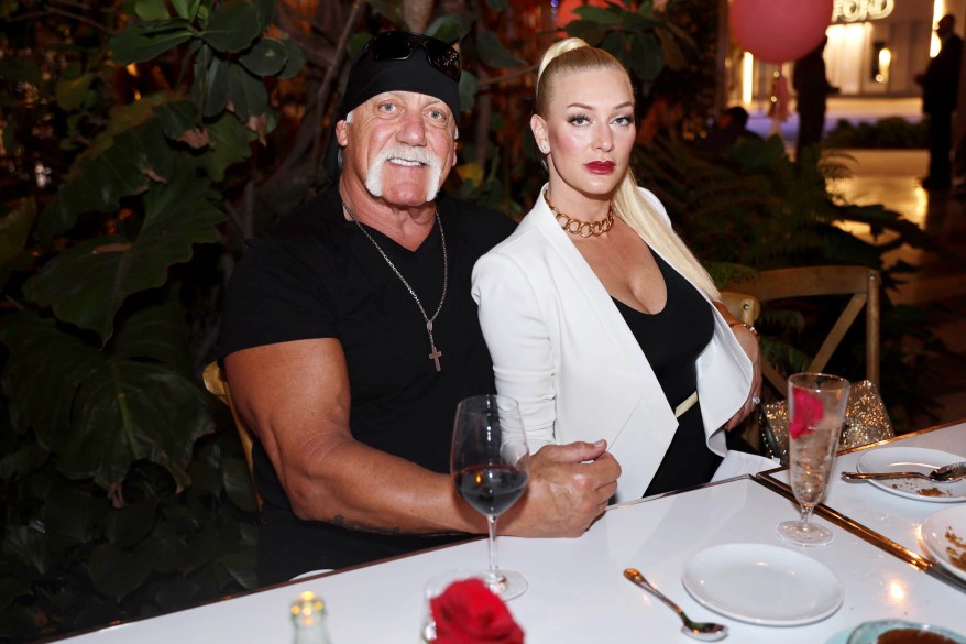 Hulk Hogan dines with his wife, Jennifer McDaniels over the New Year in Miami.