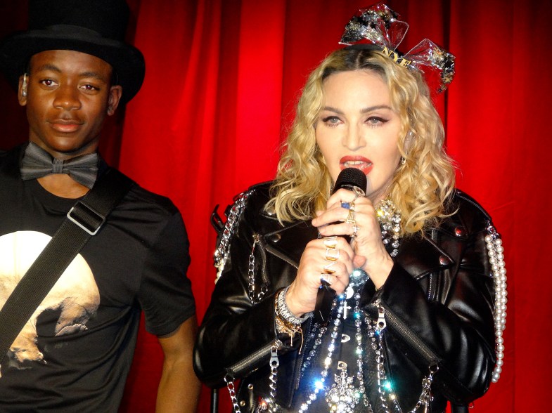 Madonna takes the stage at the Stonewall Inn in New York alongside her son, David Banda.