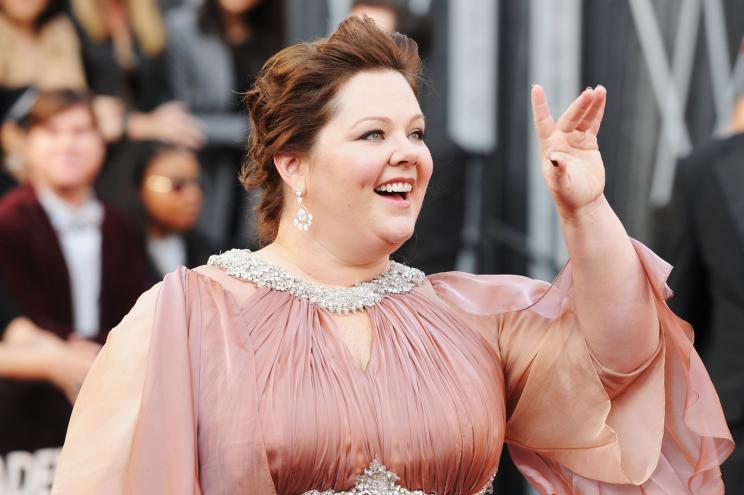 Melissa McCarthy arrives at the 84th Annual Academy Awards.