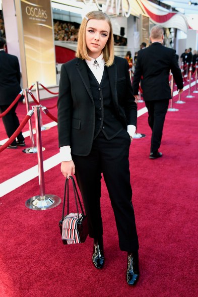 While the Oscars red carpet is usually all about the gowns, these ladies mixed things up by opting for more masculine black-tie apparel instead. Elsie Fisher continued her awards show suiting streak in a Thom Browne three-piece look.