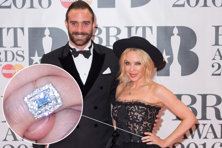 Kylie Minogue's ex-fiancé proposed with an emerald-cut diamond surrounded by two halos for a unique setting.