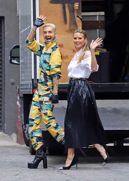 Heidi Klum and future brother-in-law Bill Kaulitz stay in high spirits as they brave the rain to film scenes for Germany's Next Top Model in Downtown LA.