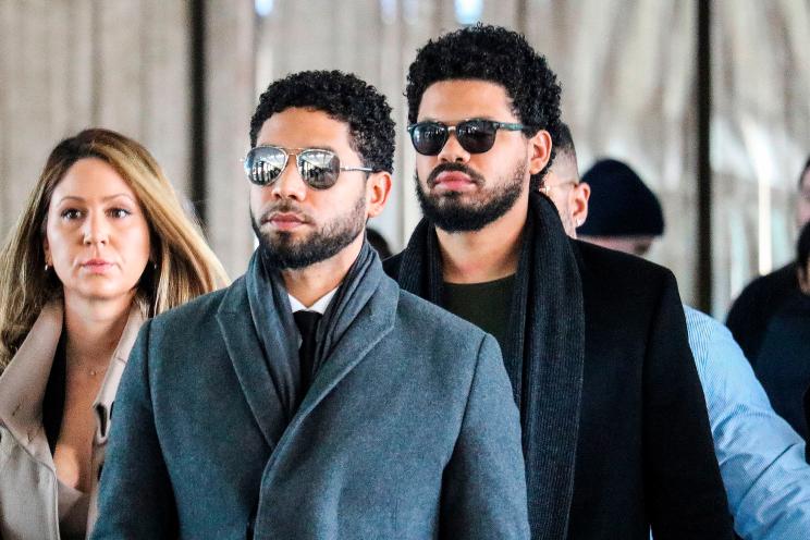 Jussie Smollett and team arrive for a court hearing at the Leighton Criminal Courthouse.