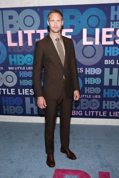 Alexander Skarsgård channeled the '70s in a brown tailored suit with a tan button-up.