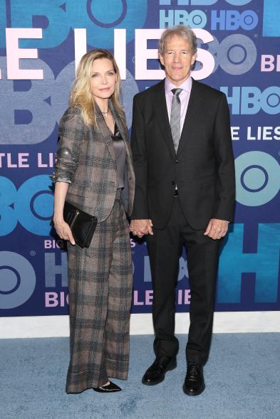 Michelle Pfeiffer supported husband David E. Kelley, creator of the HBO series, in a plaid suit.