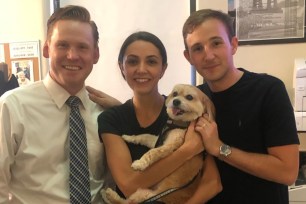 Sophie Troper (center) with her dog Benny