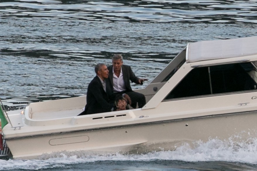 Barack Obama and George Clooney are spotted hanging out together in Italy.
