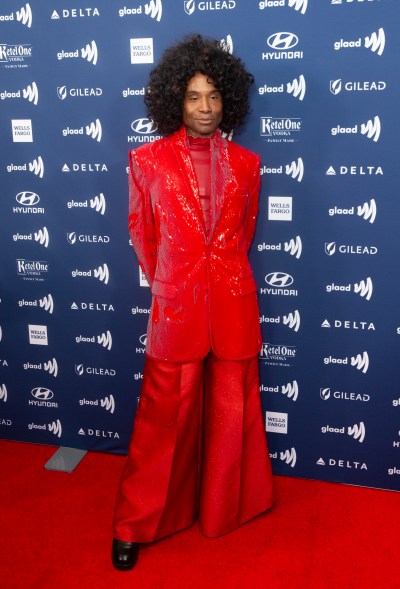 Wearing a sparkling red power suit at the GLAAD Media Awards.