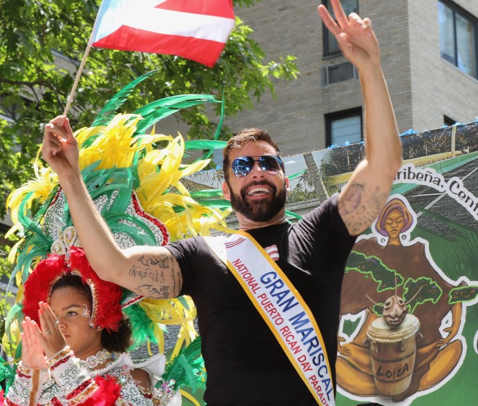 Ricky Martin parties while leading the Puerto Rican Day Parade in New York.