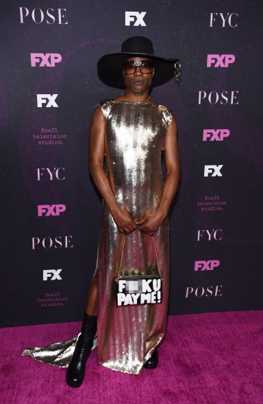 Giving a direct statement with his THESEPINKLIPS handbag at an event for "Pose."