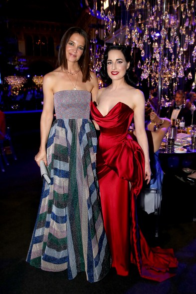 Katie Holmes and Dita Von Teese wearing dress by Lena Hoschek attend the LIFE+ Solidarity Gala prior to the last ever Life Ball in Vienna, Austria.