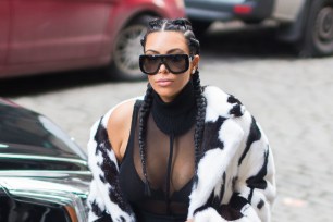 Kim Kardashian wearing a fur coat in 2016