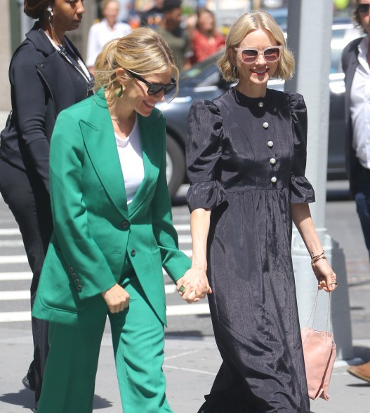 Pals Sienna Miller and Naomi Watts go hand in hand on the streets of New York.