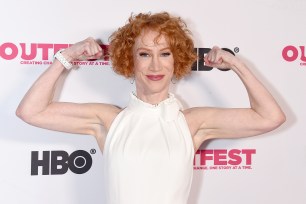 Kathy Griffin shows her muscles at the Outfest Los Angeles LGBTQ Film Festival screening of "Kathy Griffin: A Hell Of A Story."