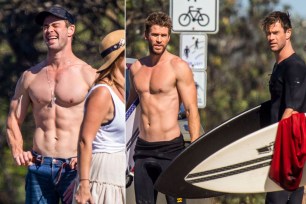 Chris and Liam Hemsworth go surfing in Byron Bay, Australia.