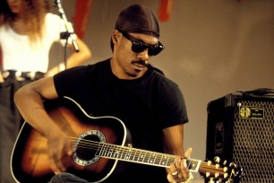 Eddie Murphy playing guitar at the Festival Of Montreux In Montreux, Switzerland in 1993.