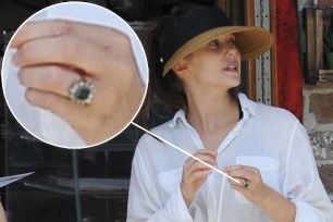 Elizabeth Olsen wearing her green emerald engagement ring.