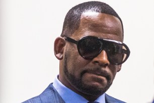 R. Kelly arrives for a child support hearing.