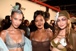 Rihanna poses with Gigi and Bella Hadid at her first-ever Savage X Fenty runway show at New York Fashion Week 2018.