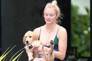 Sophie Turner with her new puppy.