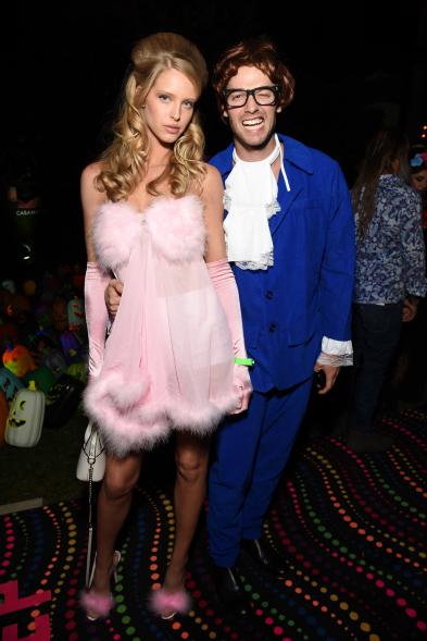 Patrick Schwarzenegger and Abby Champion as Austin Powers and a Fembot