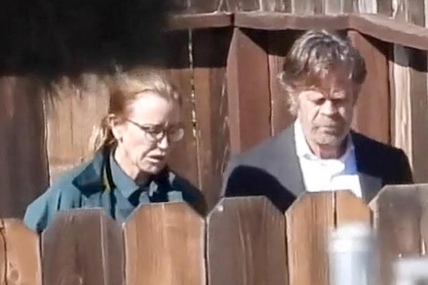 Felicity Huffman and husband William H Macy walk side by side as he visits her at FCI Dublin prison where the actress is serving a 14 day sentence for her role in the College Fraud Scandal.