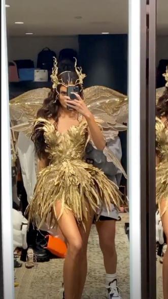 Kendall Jenner as a gilded fairy