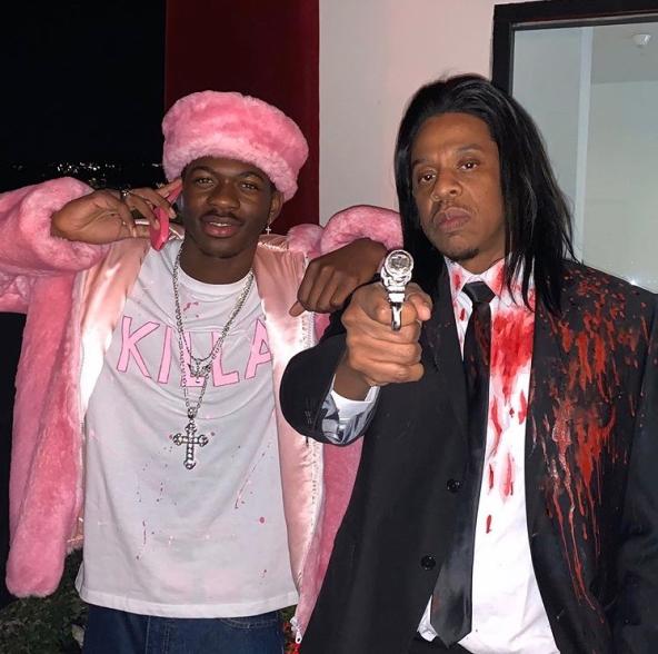 Lil Nas X as Killa Cam and Jay-Z as Vincent Vega from "Pulp Fiction"