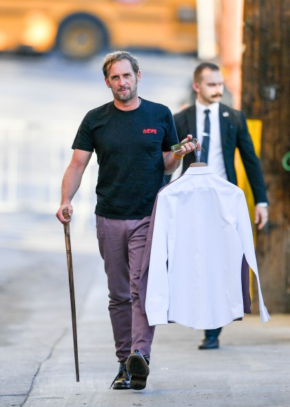 Josh Lucas steps into "Jimmy Kimmel Live" with a cane in Los Angeles.