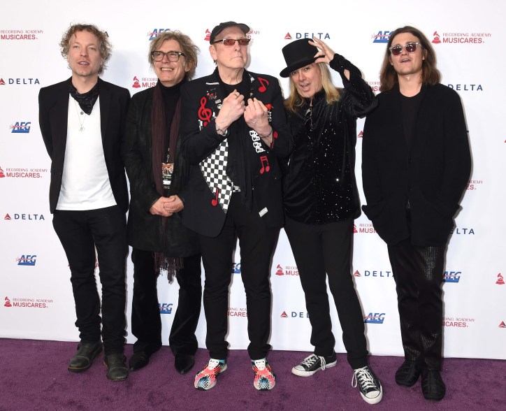 Daxx Nielsen, Tom Petersson, Rick Nielsen, Robin Zander, and Robin Taylor Zander Jr. from Cheap Trick are pictured on the red carpet at MusiCares. 